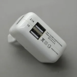 Cargador de red dual USB con salidas 2,1A y 1A para tablets y móviles